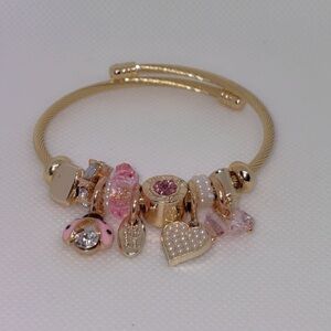 Chic Gold and Pink Charm Bracelet
